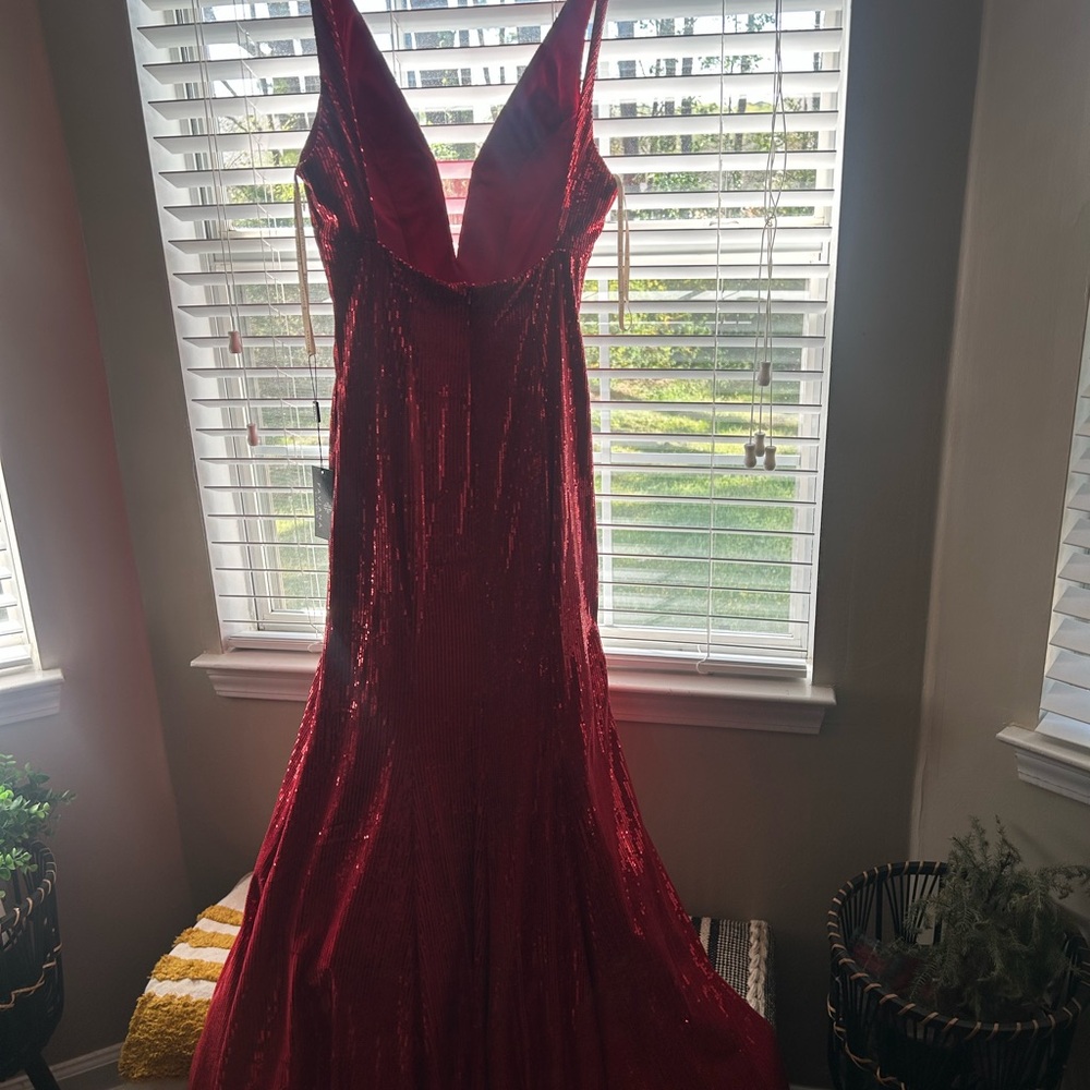 Stunning Red Sequin Gown size 8 never worn !!